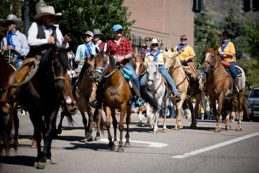 Members of the Buffalo Bill Saddle Club ride in the annual parade for Buffalo Bill Days in downtown Golden.